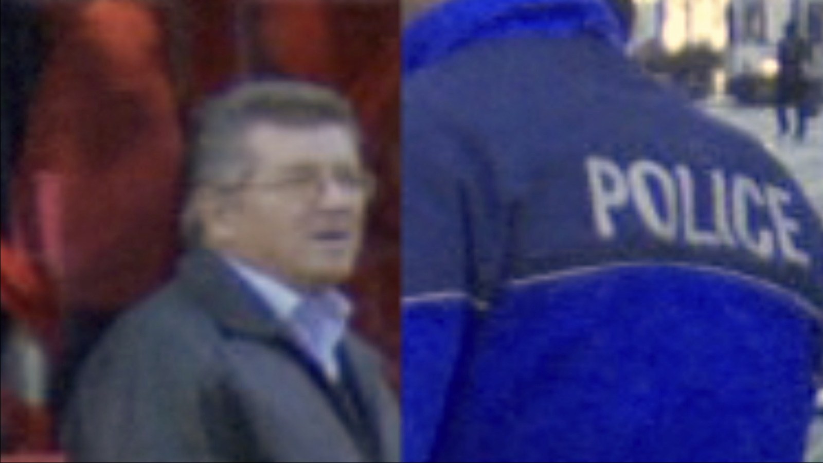 Photogramme&nbsp;: l'agrandissement est à son comble et l'image très pixellisée. À gauche, le visage d'un homme à lunettes, de profil ; à droite, le dos d'un policier en blouson bleu portant l'inscription « POLICE ».